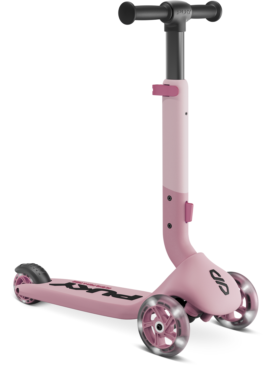 PUKY PUSH är en rosa trehjulig sparkcykel för barn med svart styre, justerbar styrstam, stora fram- och bakhjul och ett däck med varumärket PUKY.
